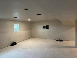 Hand Plastering Services MA & RI: Freshly applied hand plastering finish on walls and ceiling, creating smooth, elegant surfaces in a home renovation.