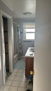 Hand Plastering Bathroom MA: Smooth hand-applied plaster finish on bathroom walls and ceiling, creating a modern and clean look.